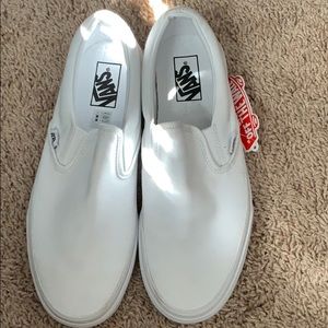 Never worn slip on white vans